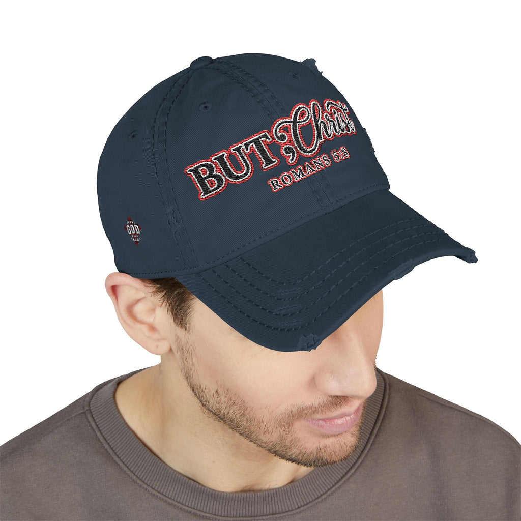 Distressed Dad Hat — “But; Christ” Our Stories Continue!  Embroidered Cap (Romans 5:8, Trust God)